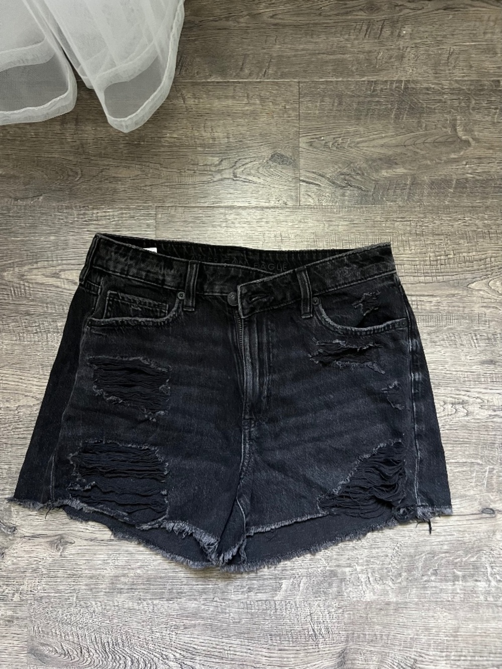 Black denim shorts